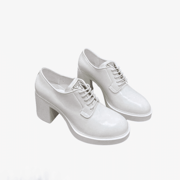 PRADA HEELED BRUSHED LEATHER LACE-UPS WHITE