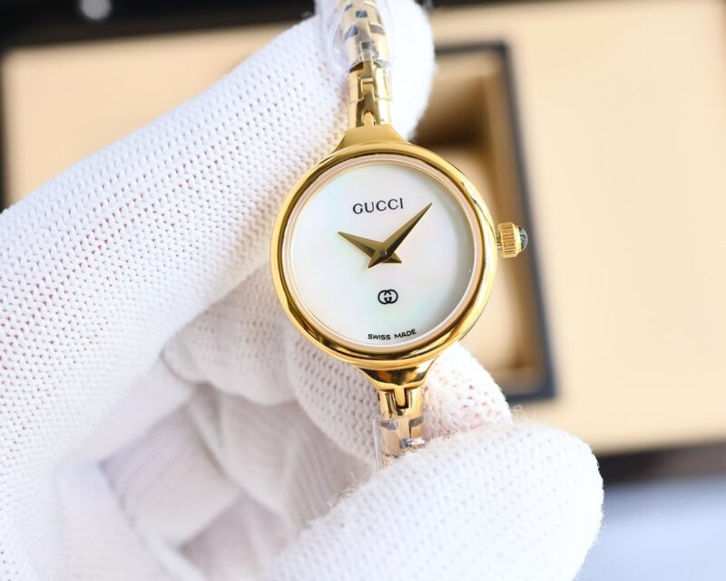 Alternative view of GUCCI LADIES WATCH ROUND CASE WITH SLIM DIAL GOLD IN WHITE 22MM