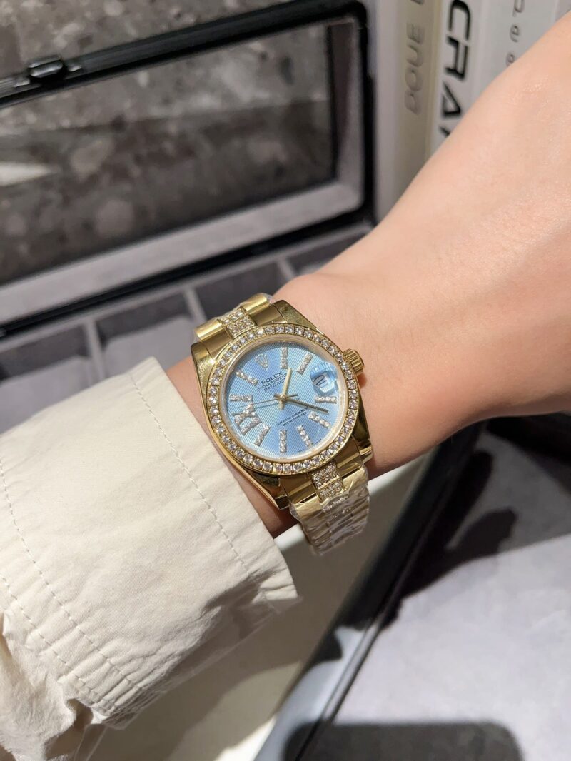 Alternative view of ROLEX DATEJUST DIAMOND IN GOLD WITH BLUE DIAL 31MM